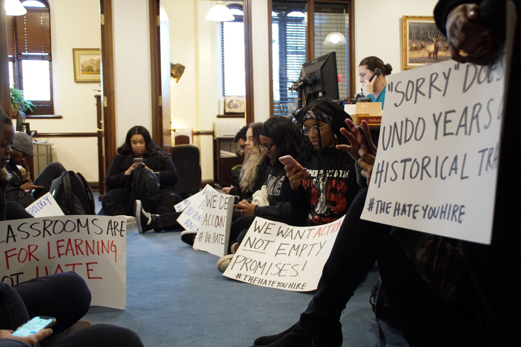 Sit-in sign